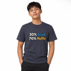 Front view of a navy T-shirt worn by a model, featuring bold distressed typography reading “30% Stud” and “70% Muffin” in blue, yellow and white.