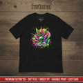 Black t-shirt with colorful cannabis leaf design on a wooden surface, featuring the brand 'StayClothed'.