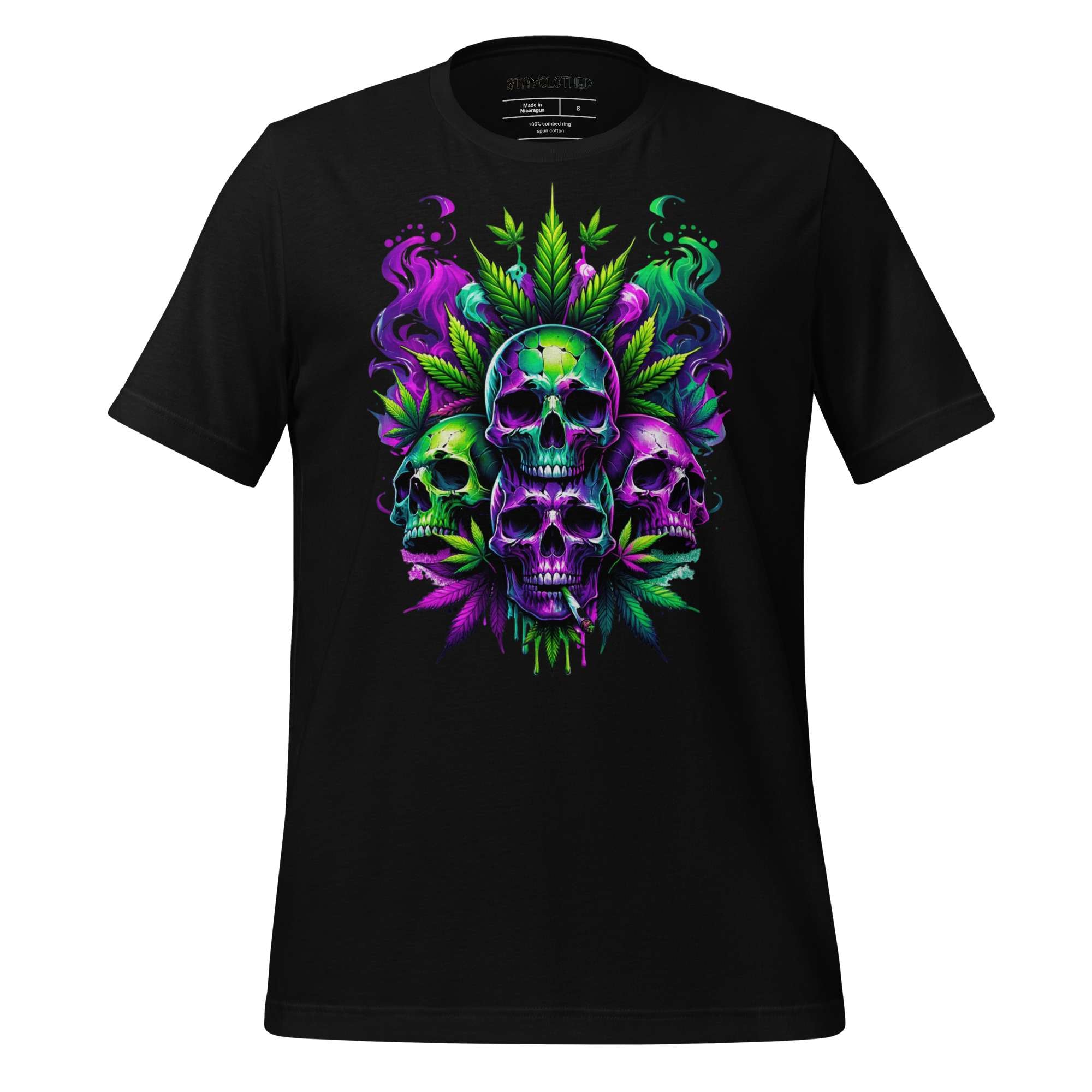 Black t-shirt with colorful cannabis skull and leaf design on a wooden surface, featuring the brand 'StayClothed'.