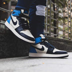 Air Jordan 1 High OG Obsidian UNC trainers close detail view