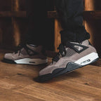 Air Jordan 4 Retro Taupe Haze trainers close detail view