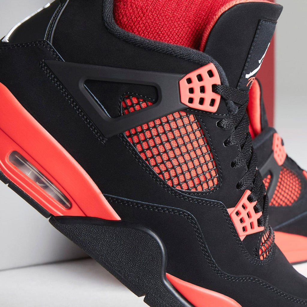 Air Jordan 4 Retro Red Thunder trainers close-up detail view