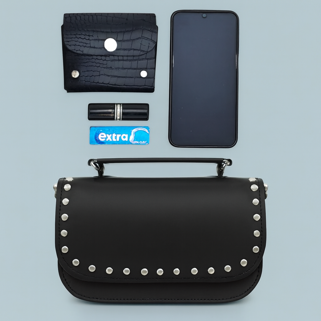 Zatchels Aura studded clutch bag contents view
