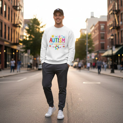 Man wearing a white autism awareness sweatshirt.