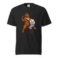 Front view of a black T-shirt featuring a vintage-style illustration of a bearded man wrestling a large roaring brown bear.