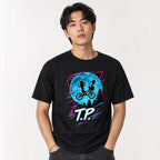 Front view of a black T-shirt featuring two children riding a bicycle against a large blue moon with pine trees and neon accents.