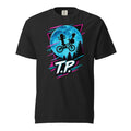 Black T-shirt featuring two children riding a bicycle before a large blue moon, with pine trees and neon accents.