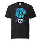 Black T-shirt featuring two children riding a bicycle before a large blue moon, with pine trees and neon accents.