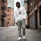 Black man wearing a white rainbow turtle sweatshirt.