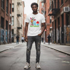 Black man wearing a white It's Okay To Be Different giraffe t-shirt.