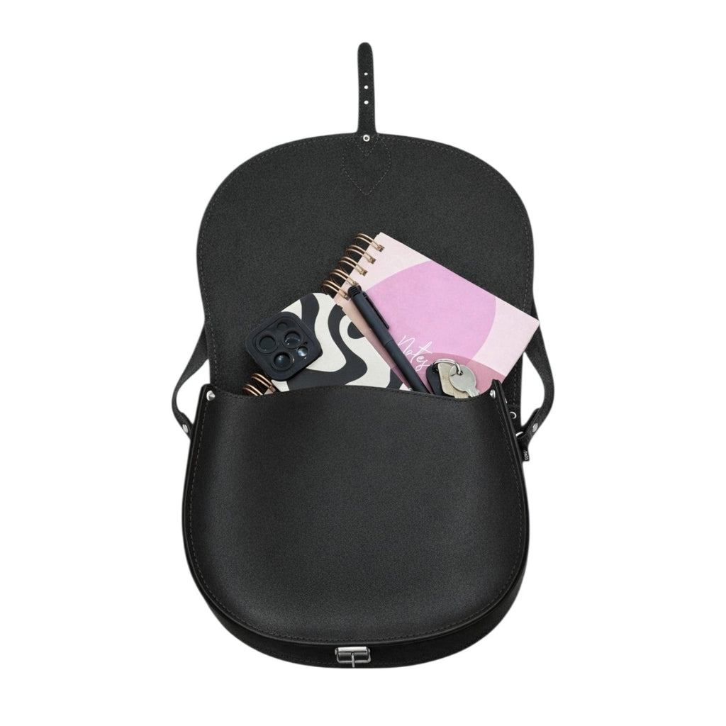 Zatchels Black leather saddle bag contents view