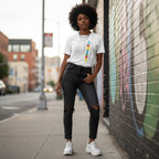 Black woman wearing a white autism awareness American flag puzzle piece t-shirt.