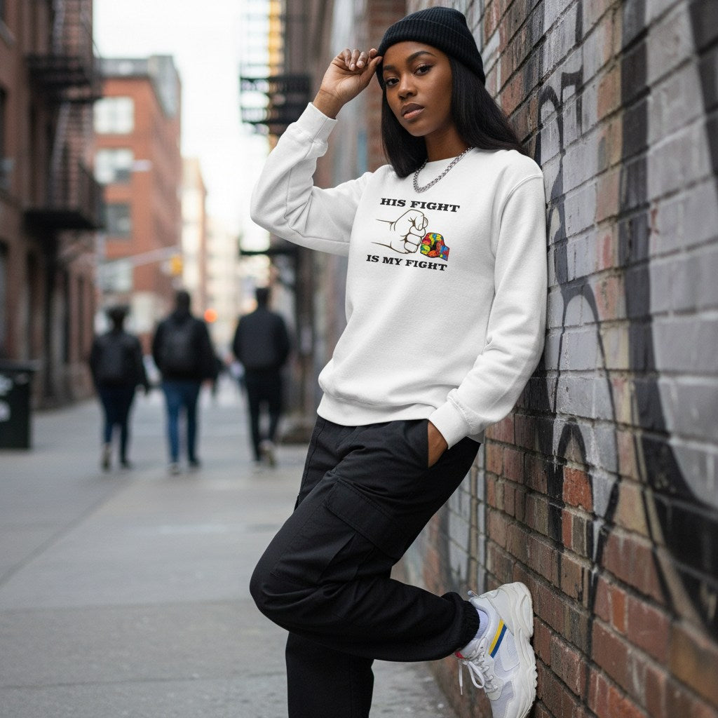 Black woman wearing a white His Fight Is My Fight autism awareness sweatshirt.