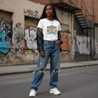 Black woman wearing a white autism awareness t-shirt.