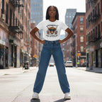 Black woman in a streetwear style photo wearing a white t-shirt.