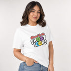 Front view of a White T-shirt on a model, featuring “Blessed be the Froot Loops” lettering with colourful cereal rings.