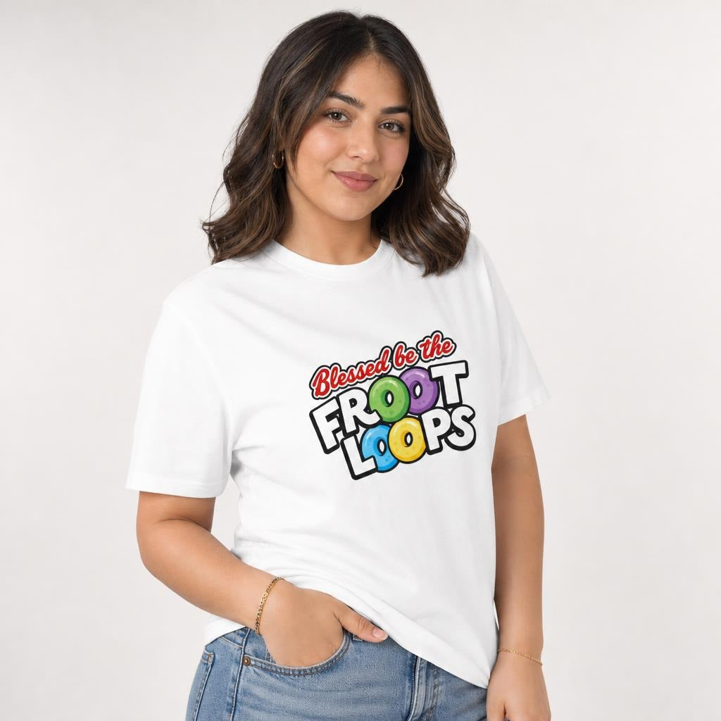 Front view of a White T-shirt on a model, featuring “Blessed be the Froot Loops” lettering with colourful cereal rings.