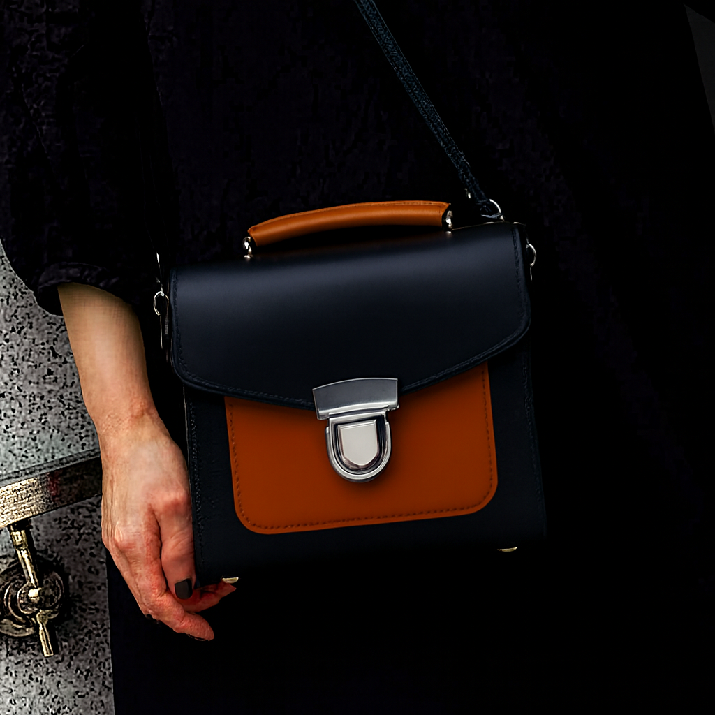 Zatchels Black Burnt Orange Sugarcube handbag model view