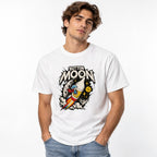 Model wearing a White T-Shirt with retro BUTTON MOON lettering, a colourful rocket, cartoon astronaut, cratered moon and yellow button.