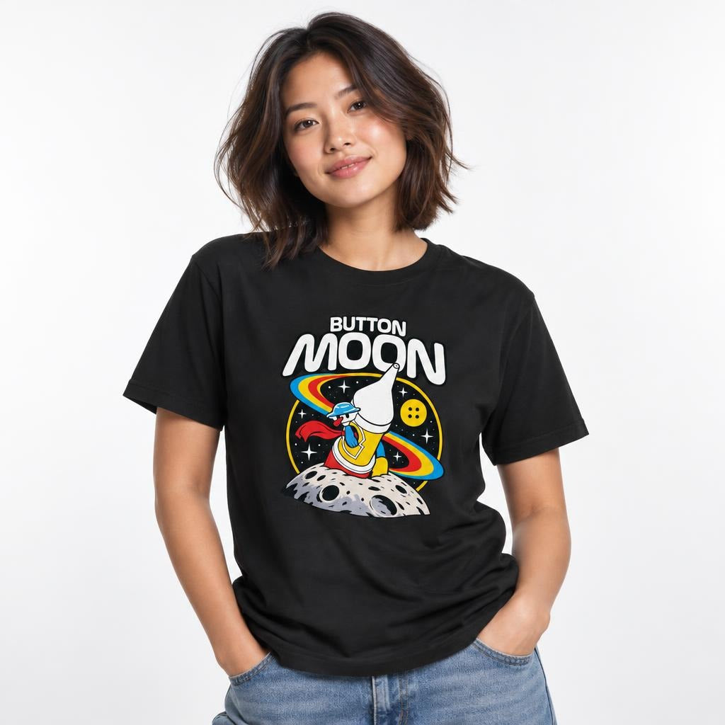 Model wearing a black T-shirt with the text “BUTTON MOON” above a colourful astronaut standing on a cratered moon.