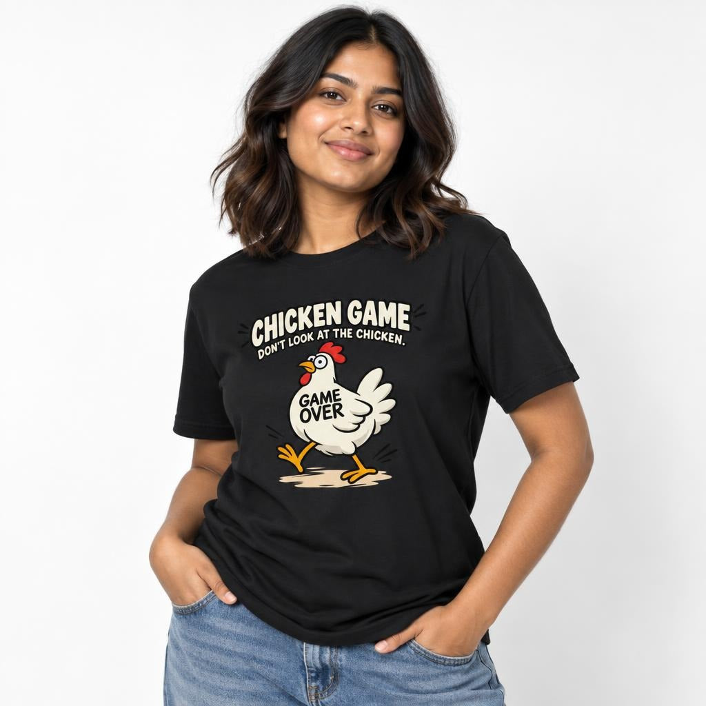 Model wearing a black T-shirt with a cartoon chicken and bold text reading “CHICKEN GAME” and “GAME OVER.”