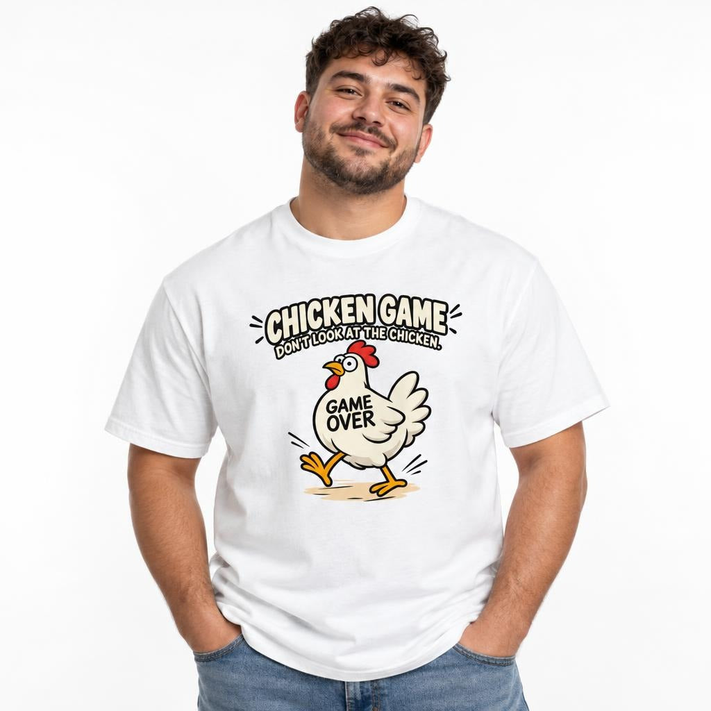 Model wearing a White T-shirt with a cartoon chicken in motion and bold “CHICKEN GAME,” “DON’T LOOK AT THE CHICKEN.” and “GAME OVER” text.