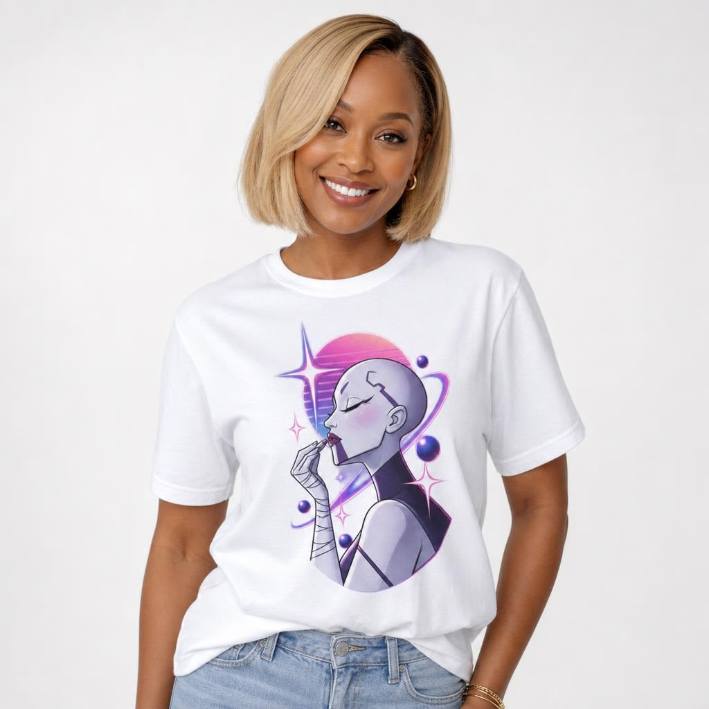 Front view of a woman applying lipstick, surrounded by pink and purple planets, orbital rings, and sparkling stars on a white T-shirt.