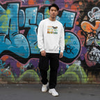 East Asian man wearing a white be kind butterfly ASL autism awareness sweatshirt.