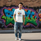 East Asian man wearing a white autism awareness T-shirt in a streetwear style.