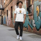 East Asian man wearing a white Support Squad autism awareness T-shirt.