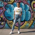 East Asian woman wearing a white Be Kind butterfly ASL t-shirt.