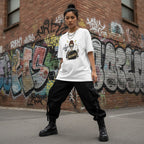 East Asian woman wearing a white graphic t-shirt in an urban streetwear setting