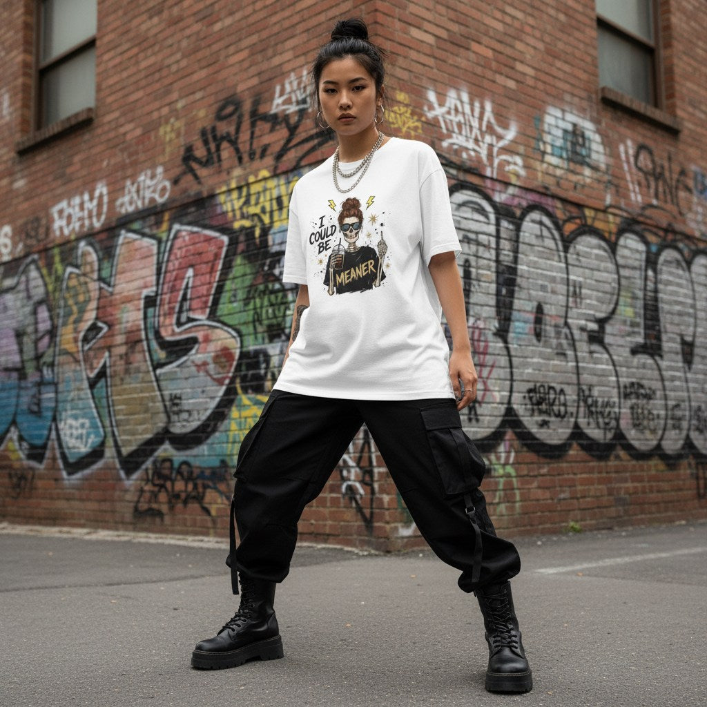 East Asian woman wearing a white graphic t-shirt in an urban streetwear setting