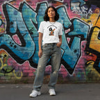East Asian woman wearing a white You'll Never Walk Alone autism awareness t-shirt.