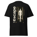 Front view of a black T-shirt featuring a human silhouette in a futuristic corridor with a wireframe sphere graphic.