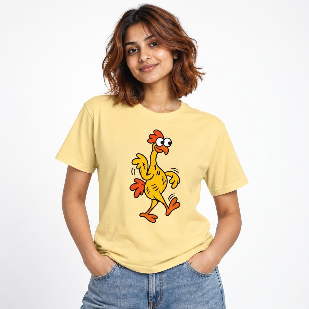 Model wearing a Butter T-shirt featuring a colourful cartoon chicken with wide eyes, wings, orange crest and waddling feet.