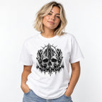 Model wearing a white T-shirt with monochrome gothic artwork of a skull, castle and hooded figures.