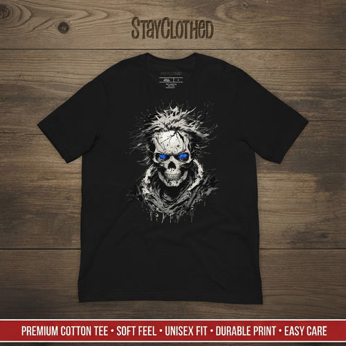 Black t-shirt with a skull design on a wooden surface, featuring the brand 'StayClothed'.