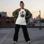 Hispanic woman in streetwear wearing a white t-shirt.