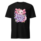 Black T-shirt featuring a pink axolotl surrounded by flowers and sparkles, with readable “Hug Me” lettering.