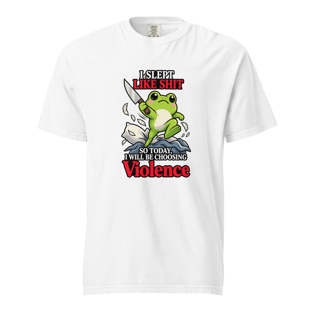 White T-shirt featuring a cute green frog holding a knife above stylised waves, with bold text reading “I SLEPT LIKE SHIT” and “CHOOSING VIOLENCE.”