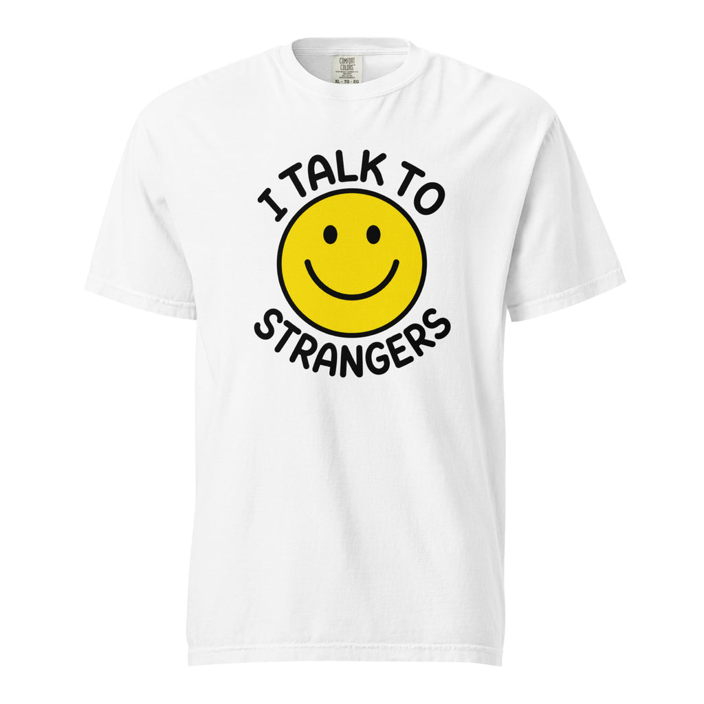 Front view of a white T-shirt featuring a yellow smiley face and black text reading “I TALK TO STRANGERS.”