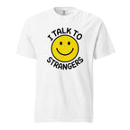 Front view of a white T-shirt featuring a yellow smiley face and black text reading “I TALK TO STRANGERS.”