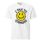 Front view of a white T-shirt featuring a distressed yellow smiley face with dripping black eyes and “I TALK TO STRANGERS” lettering.
