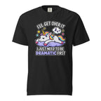 Front view of a black T-shirt with a colourful cartoon unicorn resting on a purple cloud, stars, rainbow mane and text about being dramatic.