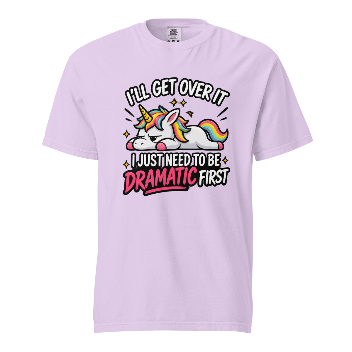 Orchid T-shirt featuring a cartoon unicorn with a rainbow mane and tail beneath the text “I’LL GET OVER IT I JUST NEED TO BE DRAMATIC FIRST.”