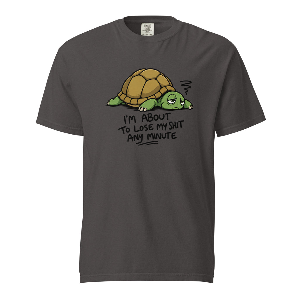 Front view of a graphite T-shirt with a tired cartoon turtle, stress mark, and the text “I’M ABOUT TO LOSE MY SHIT ANY MINUTE.”