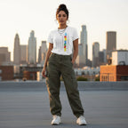 Latina woman wearing a white autism awareness American flag t-shirt.