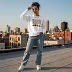 Latina woman wearing a white autism patchwork panel sweatshirt.