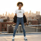 Latina woman wearing a white autism awareness t-shirt.